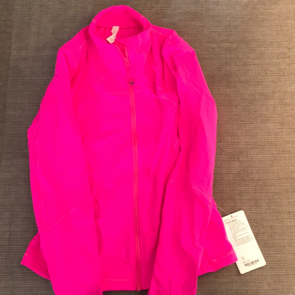 Forme fitting pink Lululemon zip up